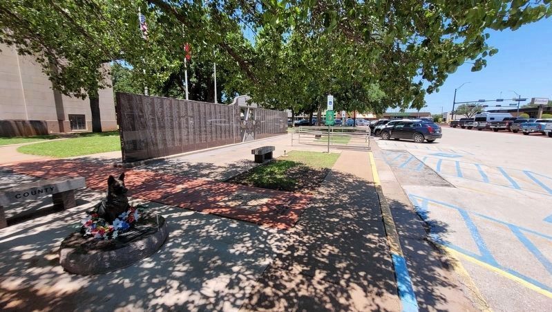 The Young County Armed Forces Memorial is on the sidewalk. Click for full size. The Young County Armed Forces Memorial is on the sidewalk image. Click for full size.