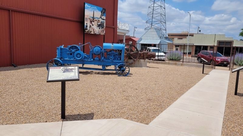 The Bessemer Gas Engine is behind the blue tractor image. Click for full size.