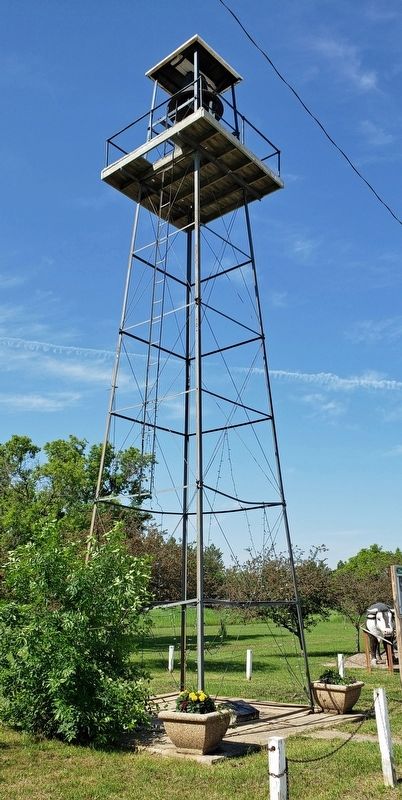 Oak Lake Fire Tower & Bell. Click for full size. Oak Lake Fire Tower & Bell image. Click for full size.