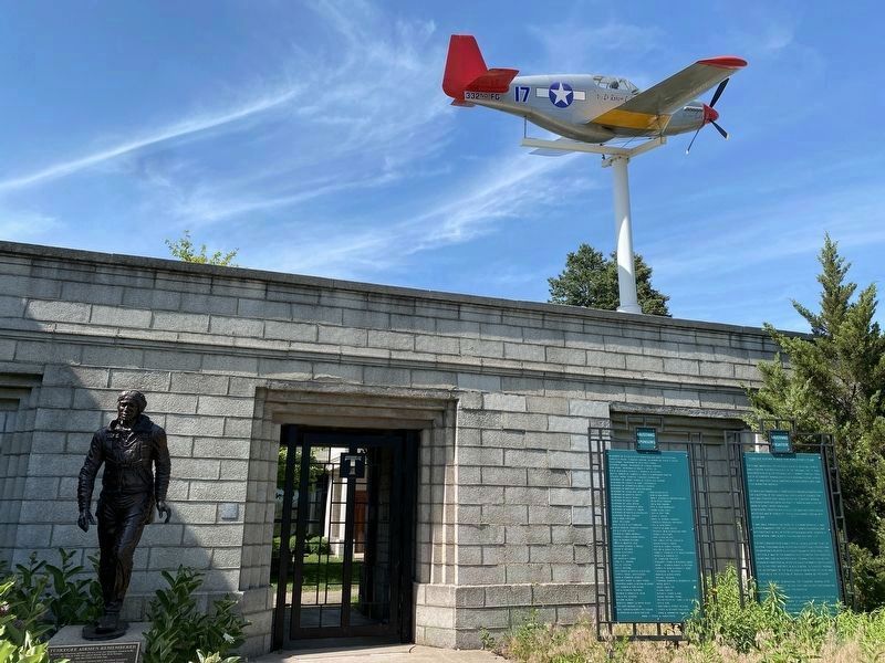 Tuskegee Airmen Statue and P-51 Mustang Fighter image. Click for full size.
