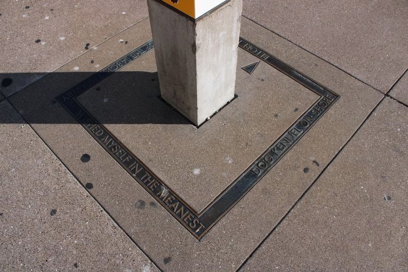 Bronze border at the base of the marker pylon, side 2 image. Click for full size.