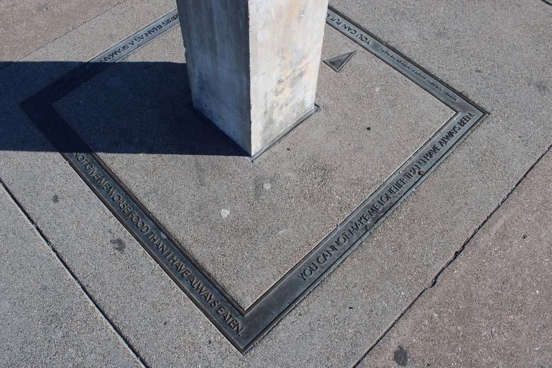 Bronze border at the base of the pylon image. Click for full size.