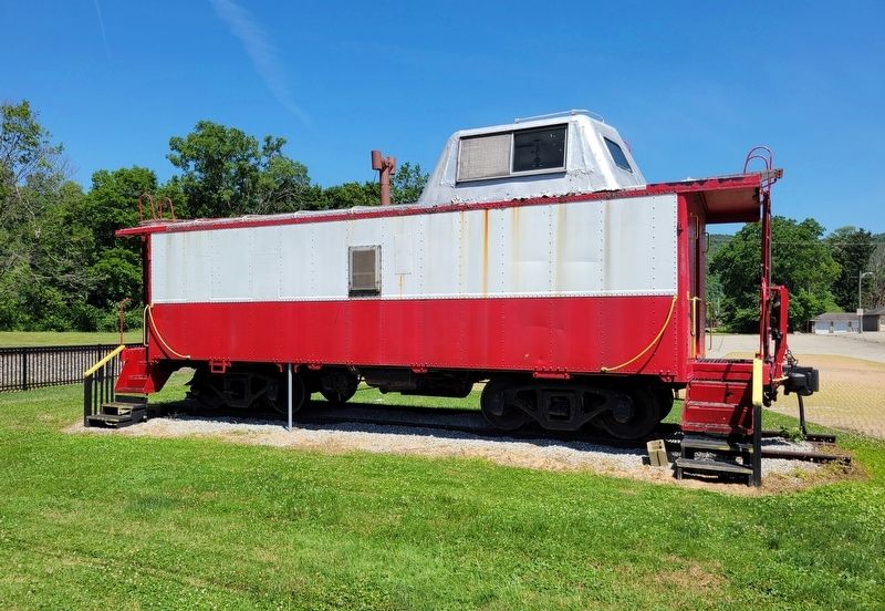 Railroad Caboose Beside the Station. Click for full size. Railroad Caboose Beside the Station image. Click for full size.