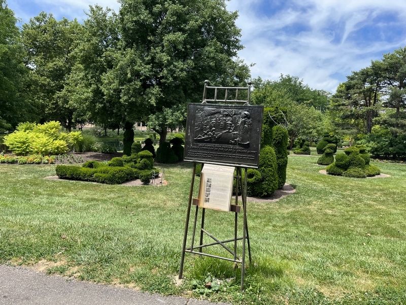 Deaf School Park Topiary Garden marker with the yews in visible in the background image. Click for full size.