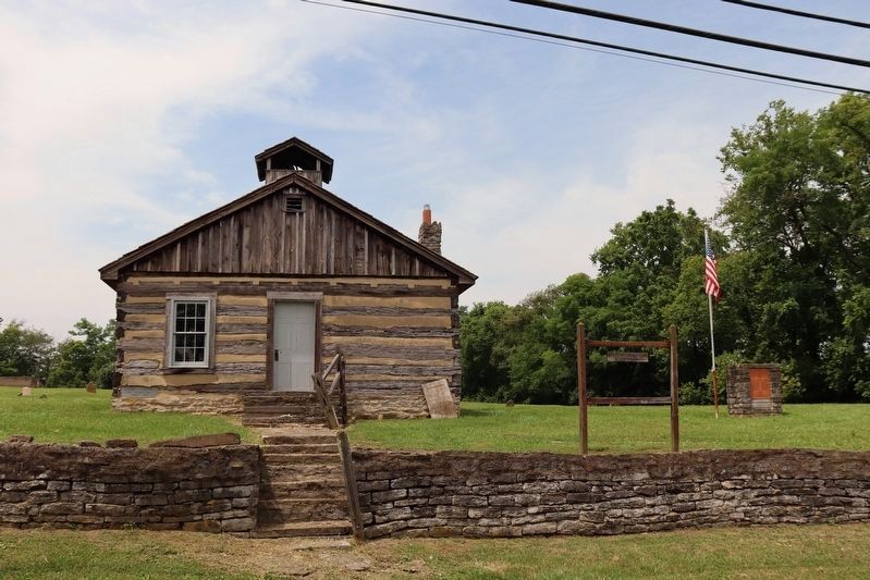 Memorial can be seen to right of log cabin.. Click for full size. Memorial can be seen to right of log cabin. image. Click for full size.