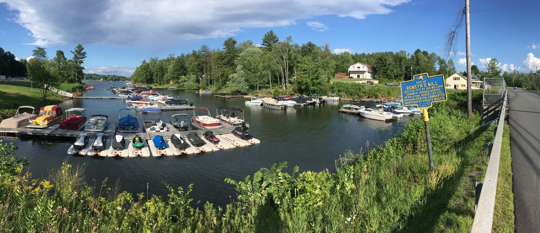 Romeyn's Mill Marker, Overlooking the Marina at the Southern end of the Great Sacandaga Reservoir. Click for full size. Romeyn's Mill Marker, Overlooking the Marina at the Southern end of the Great Sacandaga Reservoir image. Click for full size.