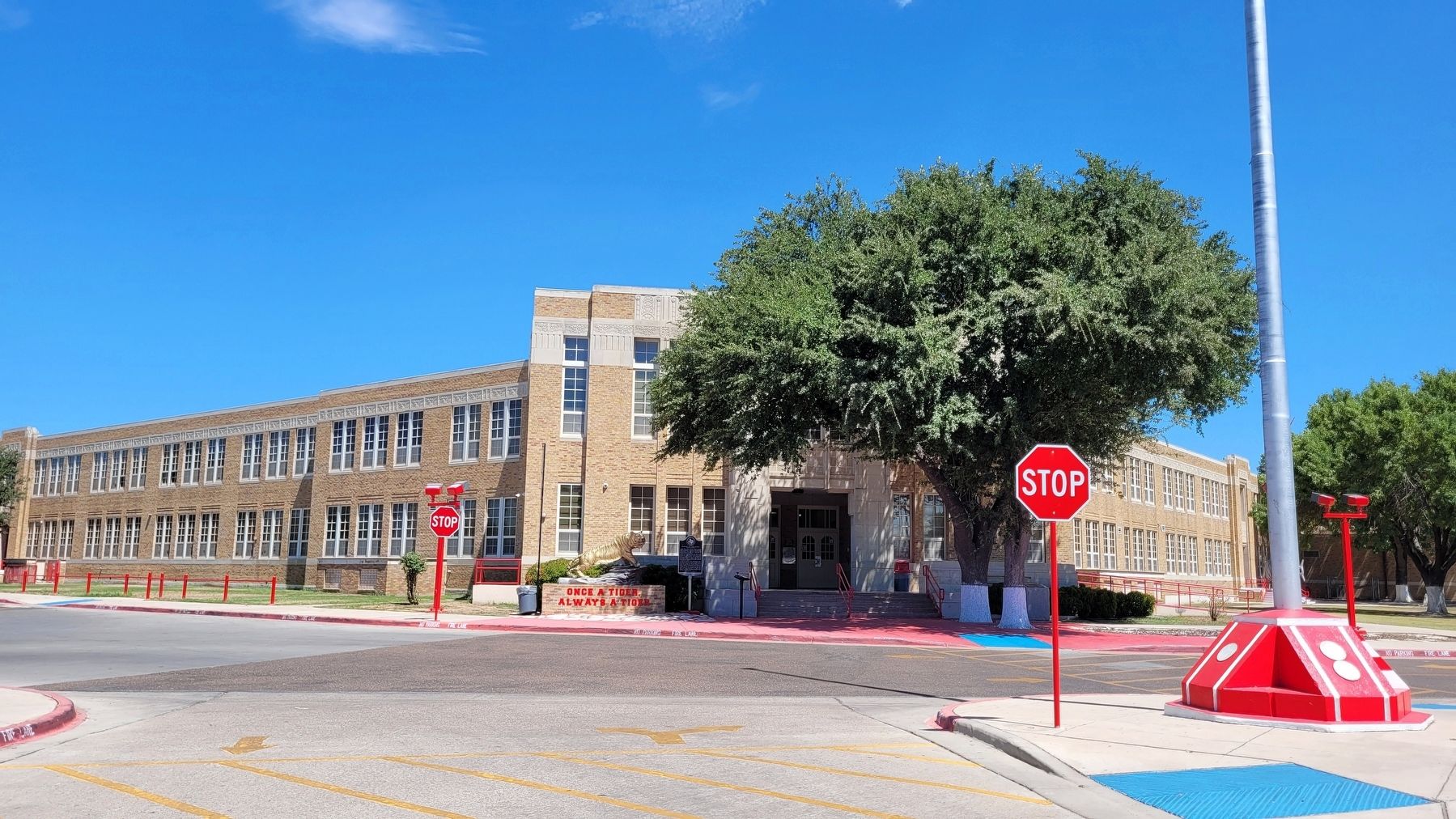 The view of the Raymond and Tirza Martin High School and Marker from the parking lot image. Click for full size.