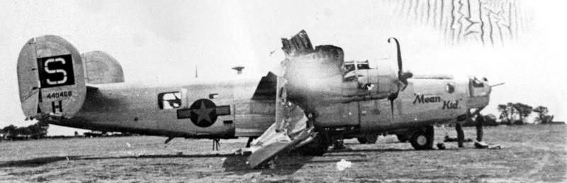 A battle damaged B-24J Liberator (s/n 44-40468) nicknamed "Mean Kid" of the 34th Bomb Group image. Click for full size.
