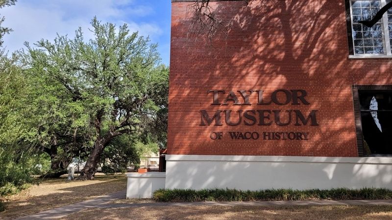 The view of the Site of Waco Indian Village Marker behind the Taylor Museum from the street image. Click for full size.