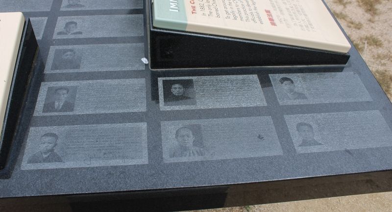 Immigration Papers Engraved in the Granite Table image. Click for full size.