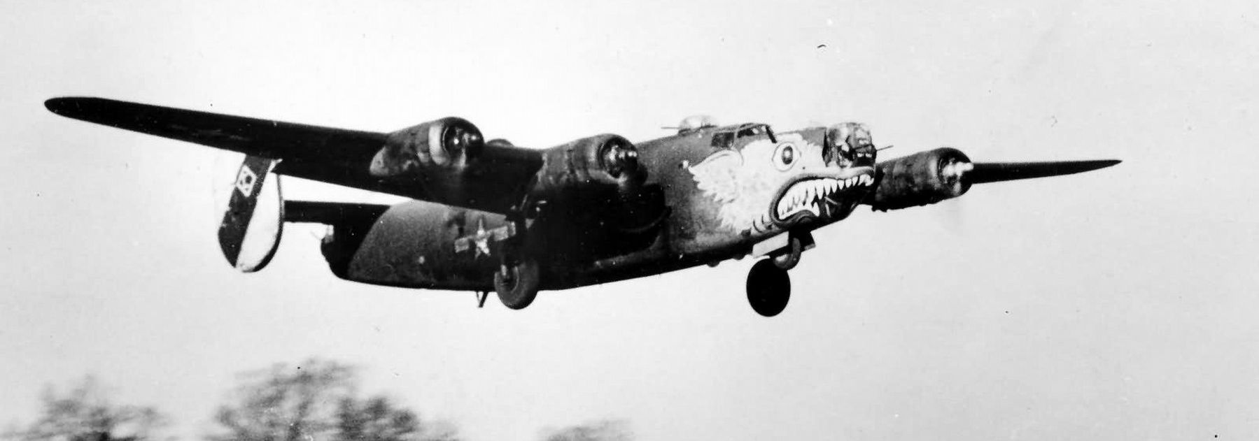B-24 Liberator 8th Air Force 448th Bomb Group taking off from Seething, England 1944 image. Click for full size.