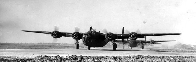 B-24 Liberators of the 44th Bomb Group line up for take off image. Click for full size.