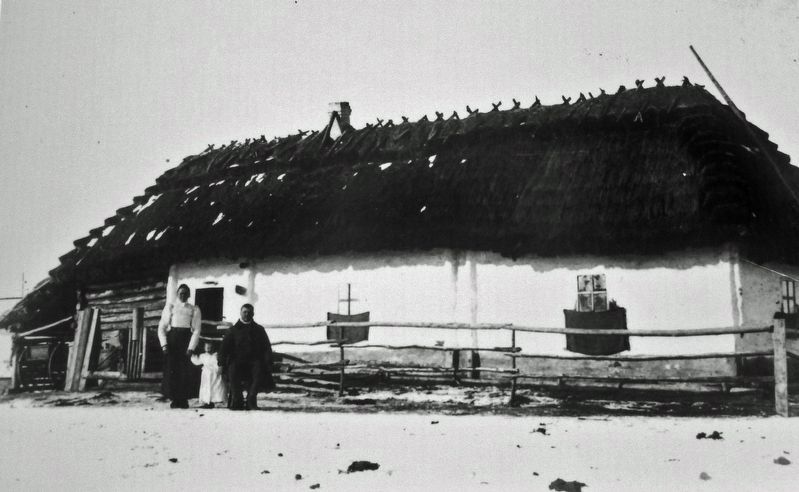 Marker detail: Early Ukrainian Dwelling, and the proud family, near Vegreville. Click for full size. Marker detail: Early Ukrainian Dwelling, and the proud family, near Vegreville image. Click for full size.