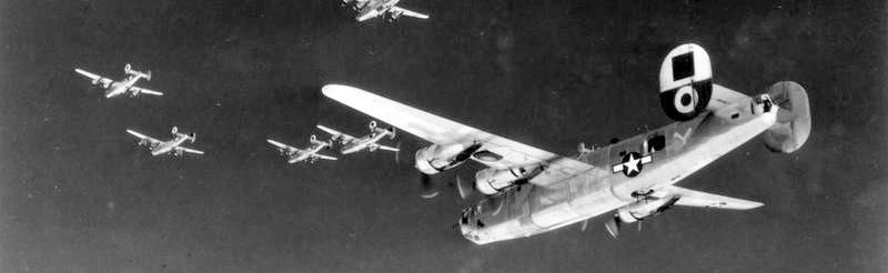 B-24 Liberators of the 460th Bomb Group, 15th Air Force fly in formation during a mission. image. Click for full size.