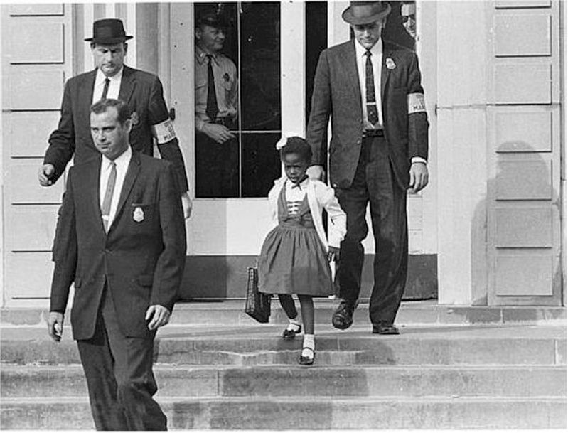 <i>U.S. Marshals escort Ruby Bridges</i>. Click for full size. <i>U.S. Marshals escort Ruby Bridges</i> image. Click for full size.