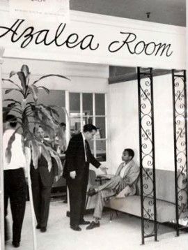 Protester being asked to leave the Azalea Room in Levys Department Store, March 1960. image. Click for more information.