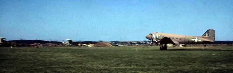 A C-47 Skytrain (serial number 42-100646) of the 313rd Troop Carrier Group, takes off from Nordholz.. Click for full size. A C-47 Skytrain (serial number 42-100646) of the 313rd Troop Carrier Group, takes off from Nordholz. image. Click for full size.