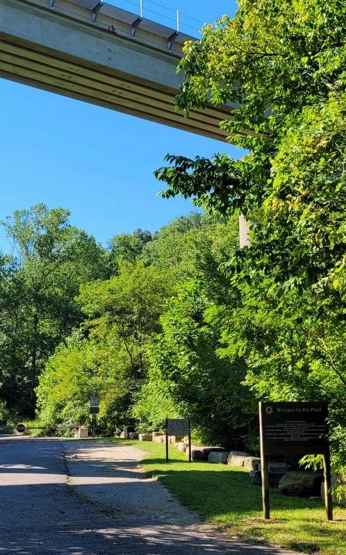 The Louisville and Nashville (L&N) Turnpike Corridor Segment Marker and railroad bridge. Click for full size. The Louisville and Nashville (L&N) Turnpike Corridor Segment Marker and railroad bridge image. Click for full size.