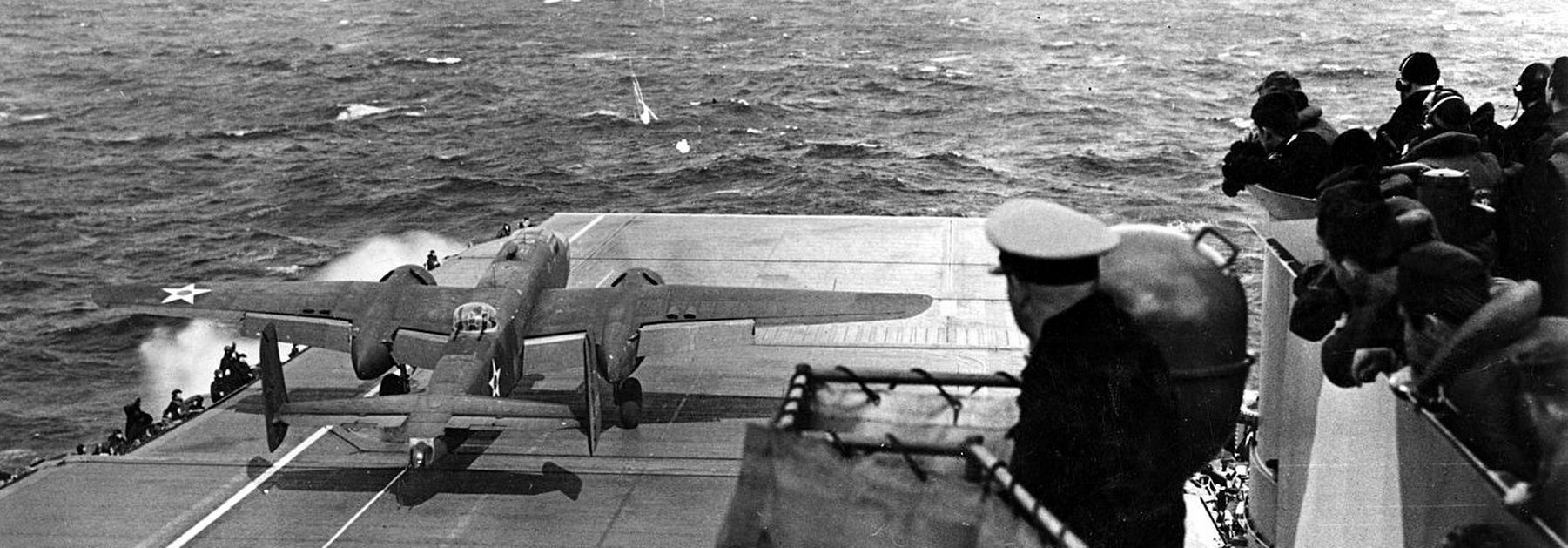 Lt. Col. James "Jimmy" Doolittle performs a full-throttle takeoff from the USS Hornet image. Click for full size.