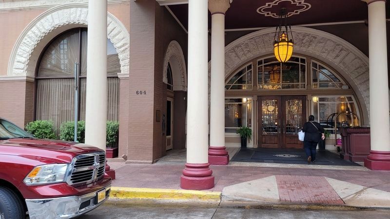 The Driskill Hotel Marker is located on the left side wall to the main entrance to the hotel image. Click for full size.