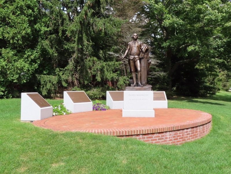 Markers next to statue of George Washington image. Click for full size.