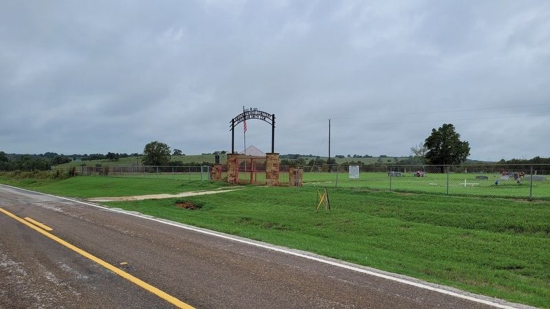 The view of the Lawhon Springs Cemetery and Marker from across the street image. Click for full size.