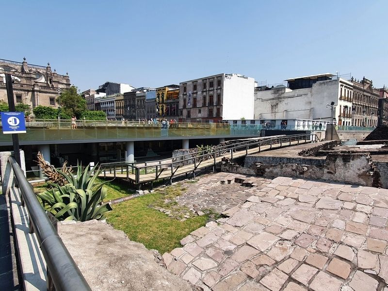 Templo Mayor entrance area with markers under a covered walkway image. Click for full size.