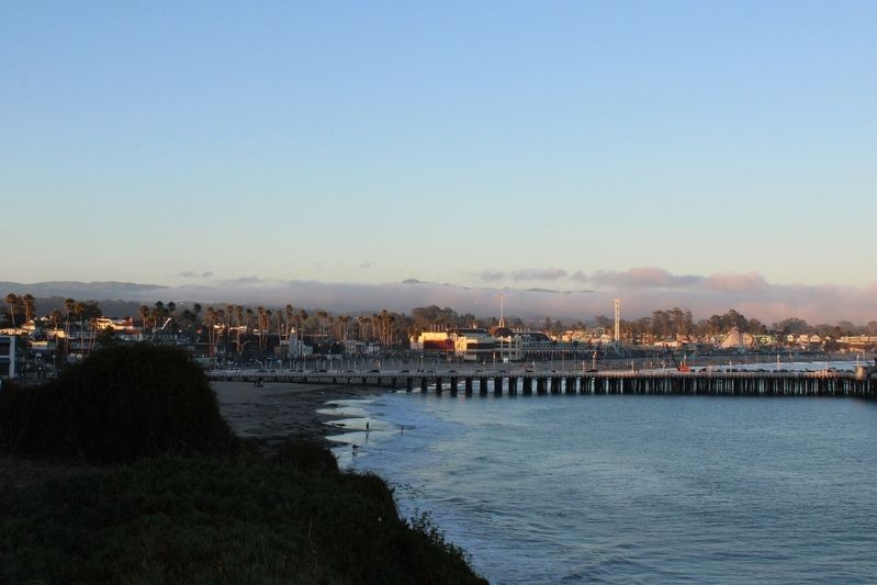 View of Santa Cruz Beach Boardwalk Behind the Wharf. Click for full size. View of Santa Cruz Beach Boardwalk Behind the Wharf image. Click for full size.