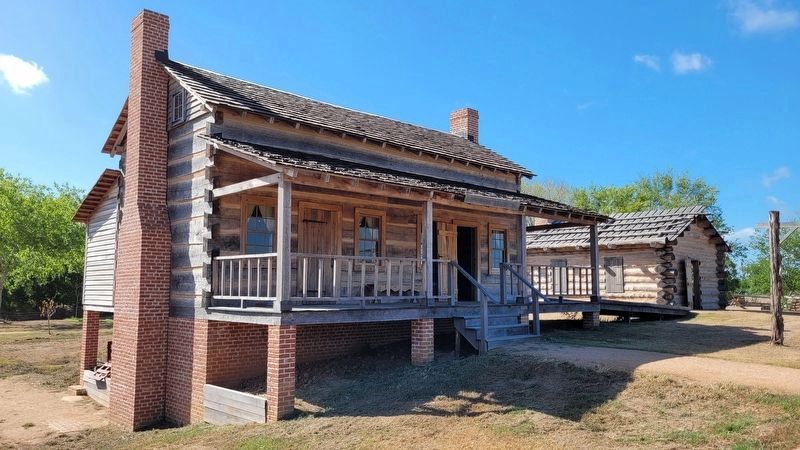 Reproduction Hotel Building on the east side of historic site image. Click for full size.