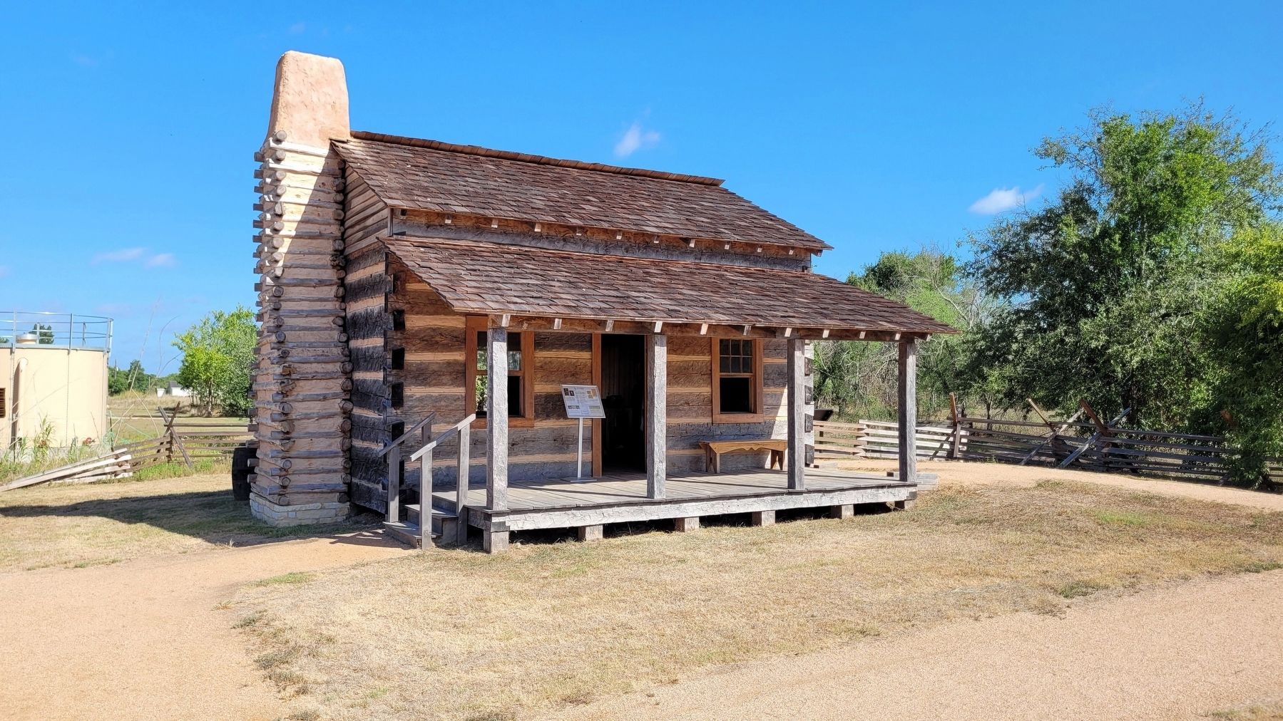 Reproduction Cabin on east side of historic site showing construction style image. Click for full size.