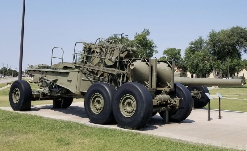 The M3A1 Carriage Transport Wagon and M1 240mm Howitzer (background) image. Click for full size.