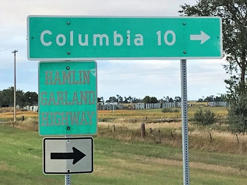 Road sign for Hamlin Garland Highway. Click for full size. Road sign for Hamlin Garland Highway image. Click for full size.