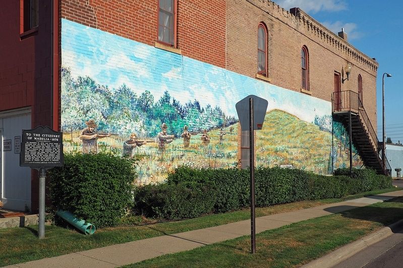 Marker and mural on the west faade of the Madelia Chamber of Commerce building image. Click for full size.