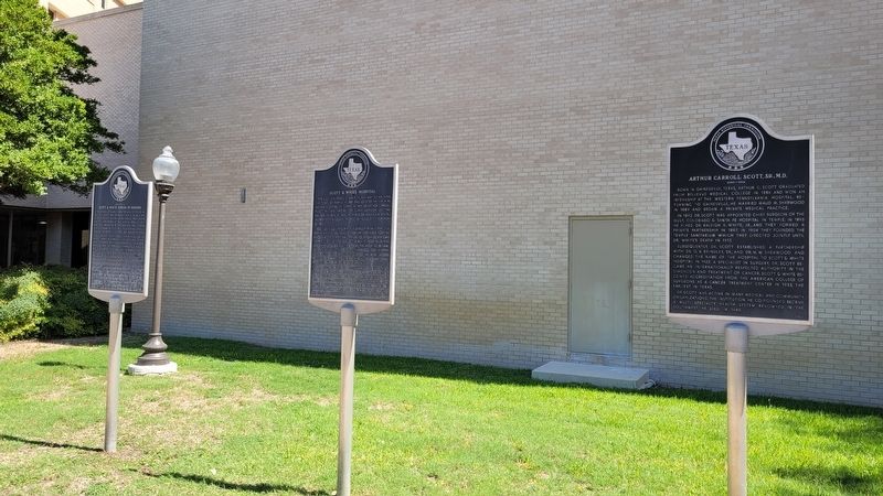 The Former Site of Scott & White School of Nursing Marker is the left marker of the markers image. Click for full size.