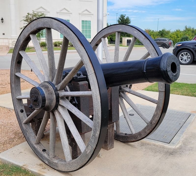 Cannon next to statue and marker image. Click for full size.
