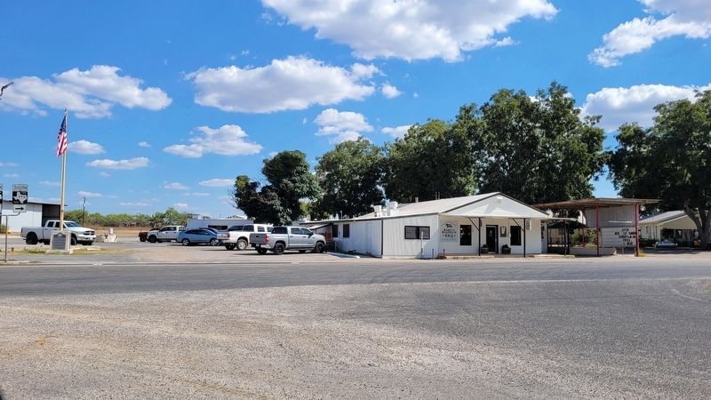The view of the Site of Muelder Store Marker from across the street. Click for full size. The view of the Site of Muelder Store Marker from across the street image. Click for full size.
