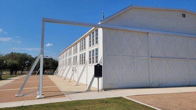 The Edward H. White II Memorial Hangar, Brooks Air Force Base Marker next to Hanger 9 image. Click for full size.