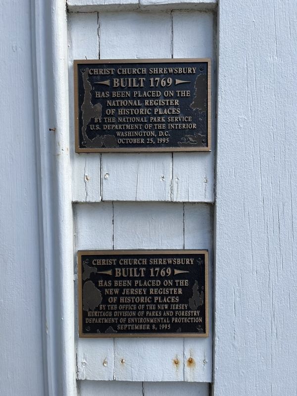 State and National Registers of Historic Places plaques on the church building image. Click for full size.