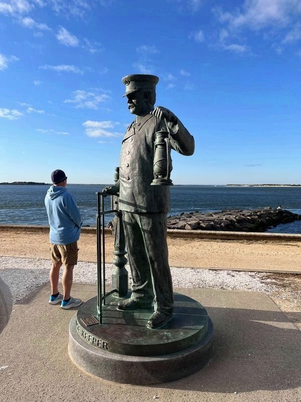 Adjacent statue of a Lighthouse Keeper image. Click for full size.