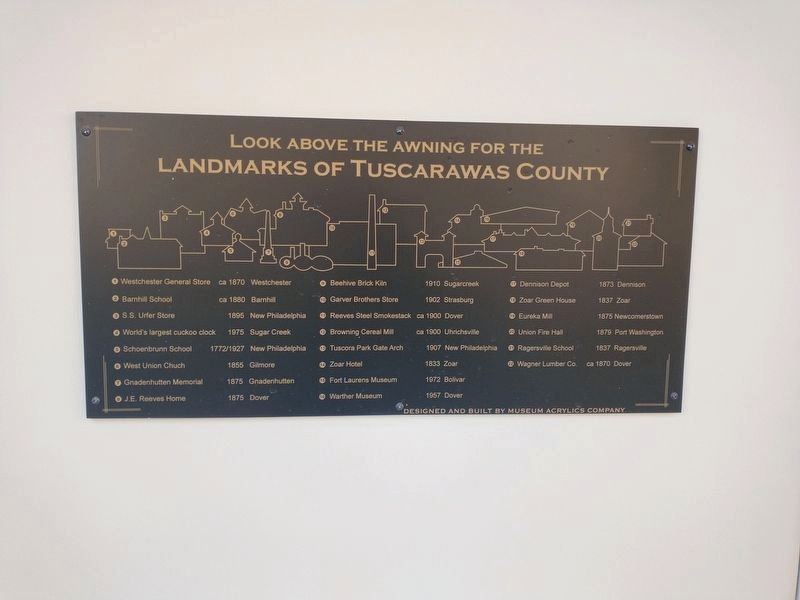 Look above the awning for the Landmarks of Tuscarawas County Marker image. Click for full size.