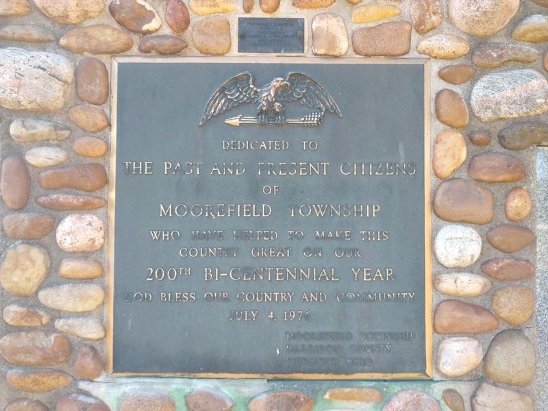 Dedication plaque on the grounds image. Click for full size.