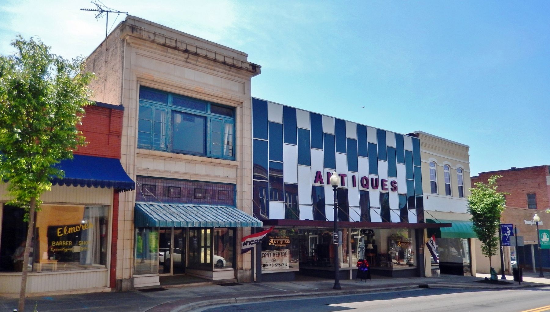 Sinkoe Building and Adjacent Storefronts. Click for full size. Sinkoe Building and Adjacent Storefronts image. Click for full size.