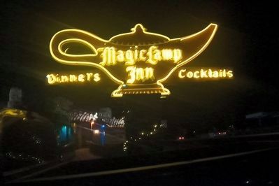 Magic Lamp Inn sign at night image. Click for full size.