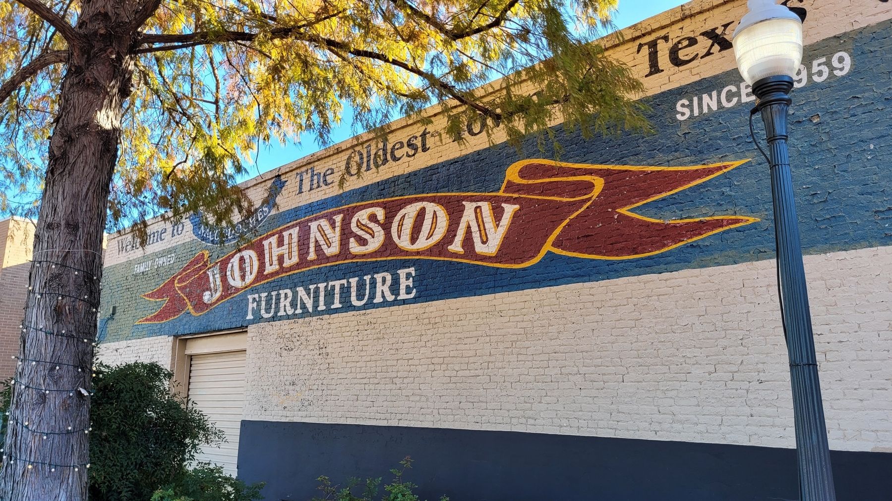 A Johnson Furniture mural across the street from the marker image. Click for full size.