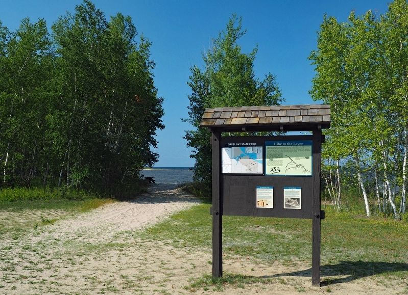 Markers on a signboard at the Zippel Bay State Park beach image. Click for full size.