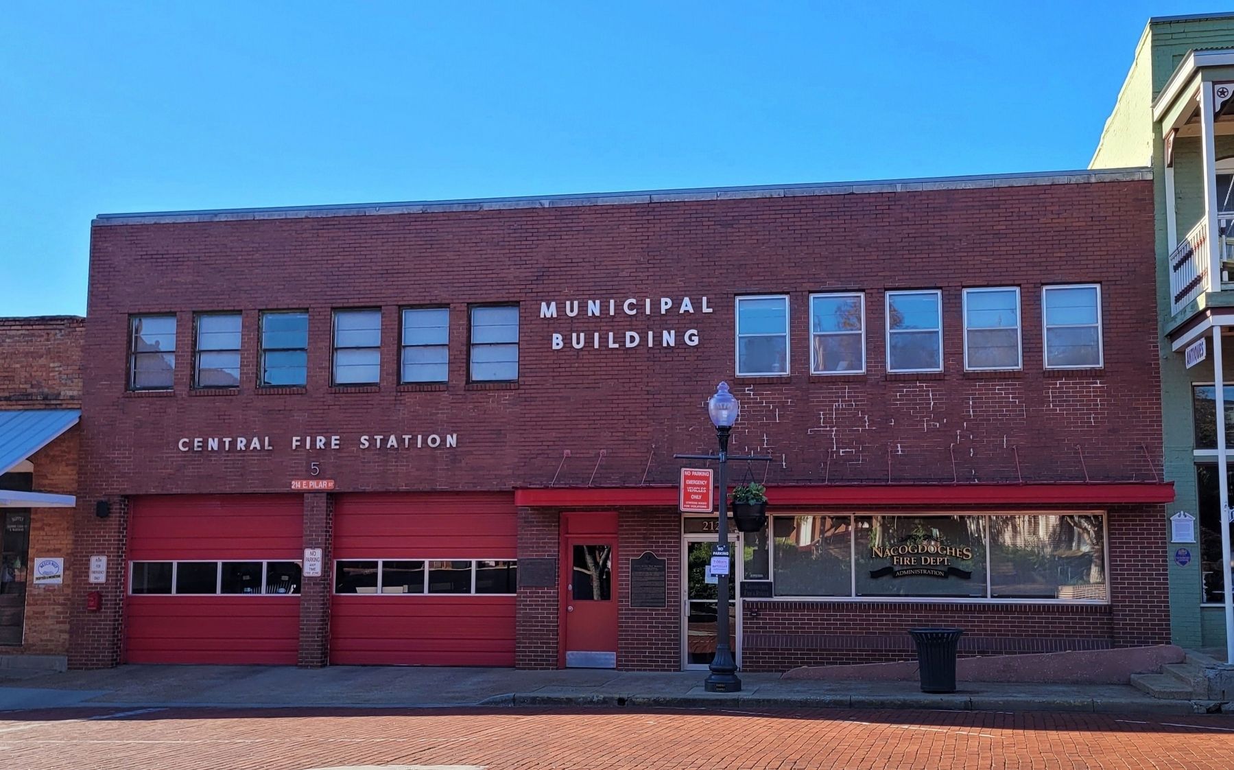 The Robert Wynne "Bob" Murphey Marker is located between the two doors on the fire station image. Click for full size.