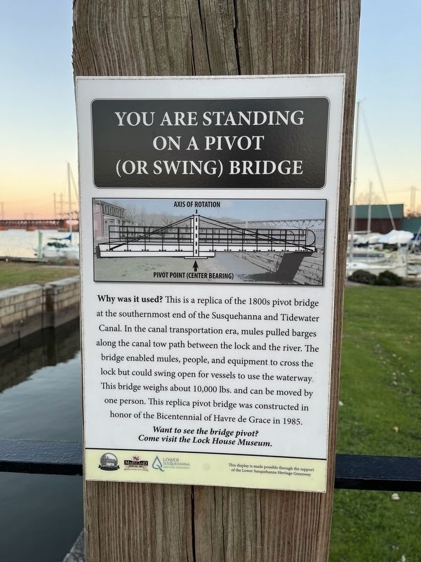 You Are Standing On A Pivot (Or Swing) Bridge Marker. Click for full size. You Are Standing On A Pivot (Or Swing) Bridge Marker image. Click for full size.