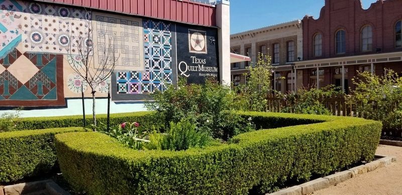 The view of the garden and the Texas Quilt Museum from the markers image. Click for full size.