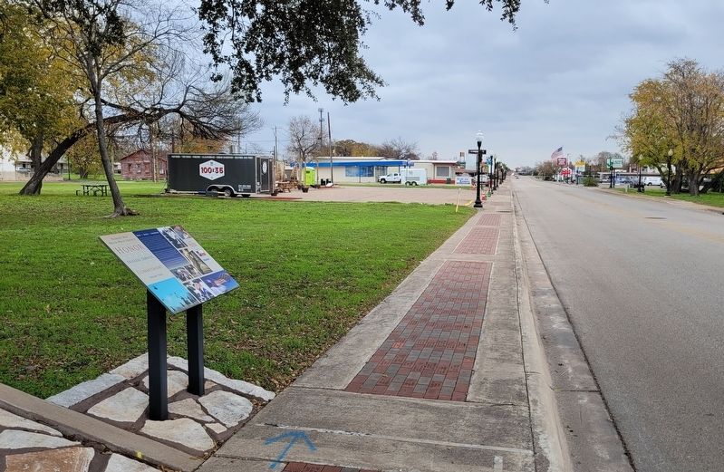 The view of the Patriot Way Brick Walk Project Marker along the sidewalk image. Click for full size.