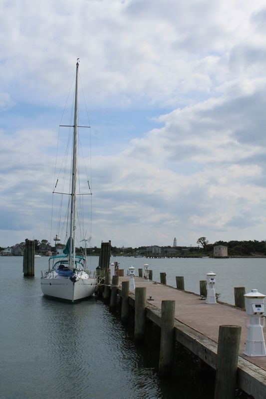 View from Ocracoke Island. Ocracoke Lighthouse in background. image. Click for full size.